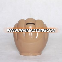 Chinese Supplier Cartoon Resin Fist Shape Coin Bank